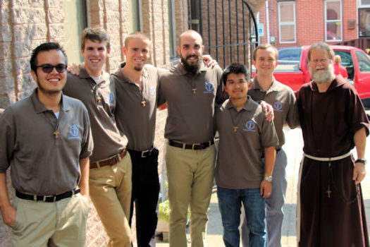Brother Kip Ledger, Guardian of the Friary (R) and the postulants at the St. Joachim Feast Day Mass held in July. 